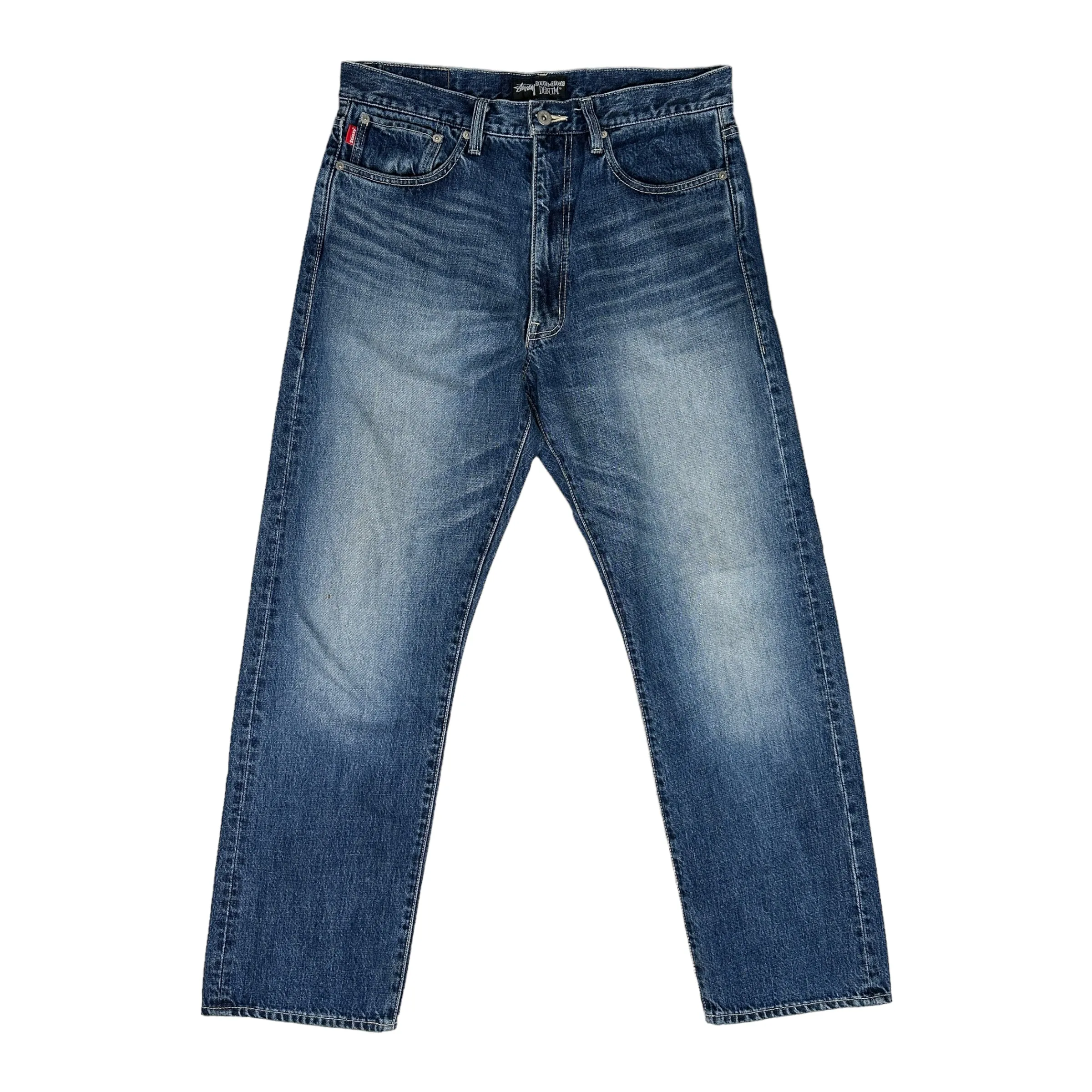 STUSSY BACK ARC SPELLOUT LIGHTWASH JEANS